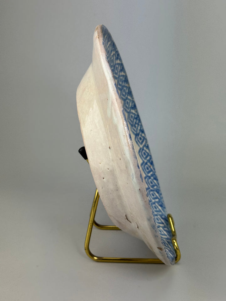 Piatto in maiolica decorata in blu produzione popolare italiana