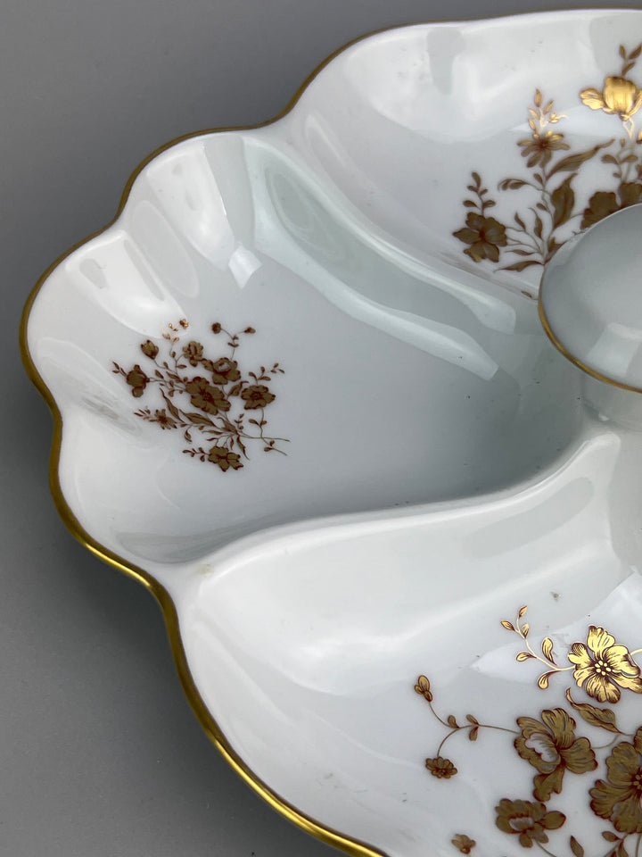 Piatto in porcellana Limoges con decoro dorato