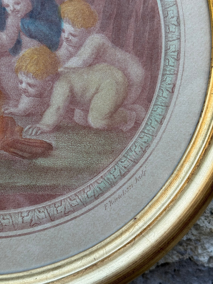 Stampe tonde con raffigurazione putti con cornici dorate