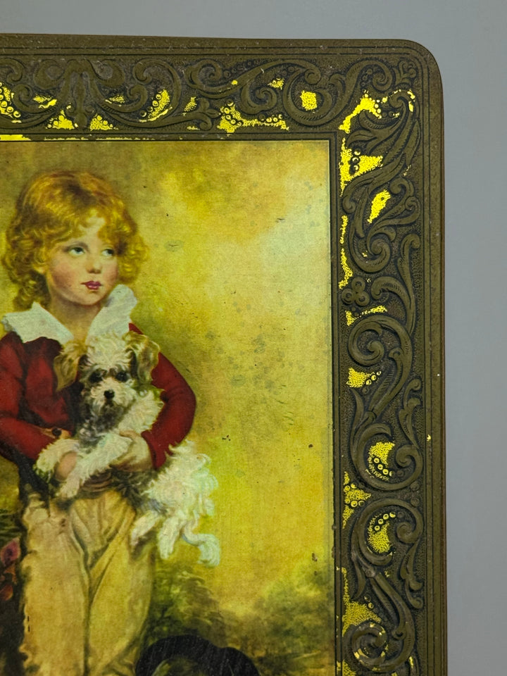 Scatola di latta vintage per torrone Rocco Scutellà e Figlio Bambino con cagnolino