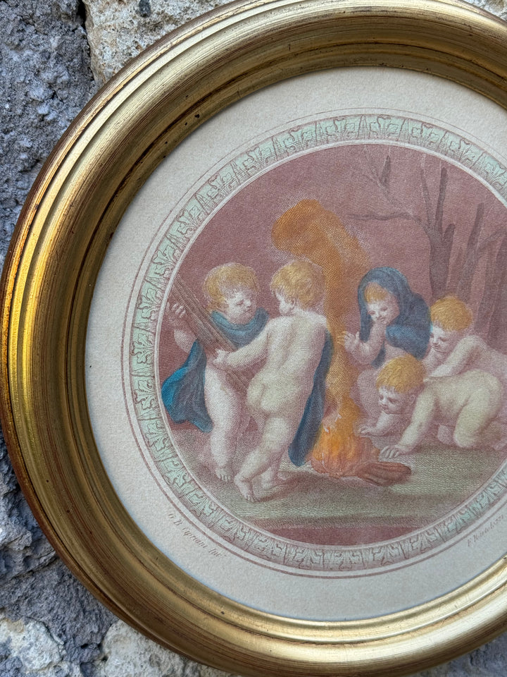 Stampe tonde con raffigurazione putti con cornici dorate