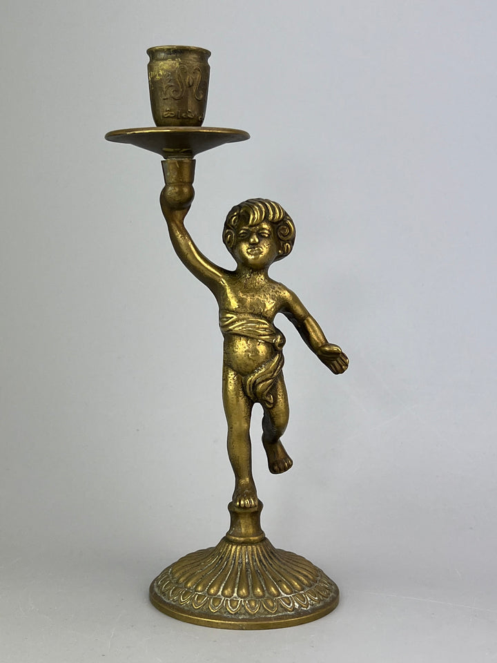 Coppia di putti portacandela in ottone dorato
