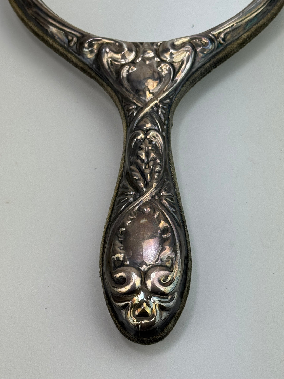Specchietto da mano in argento cesellato decoro floreale Liberty
