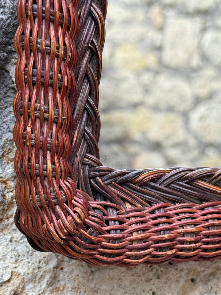 Specchietto in rattan intrecciato vintage