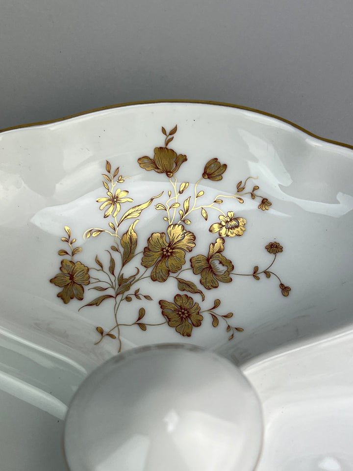 Piatto in porcellana Limoges con decoro dorato