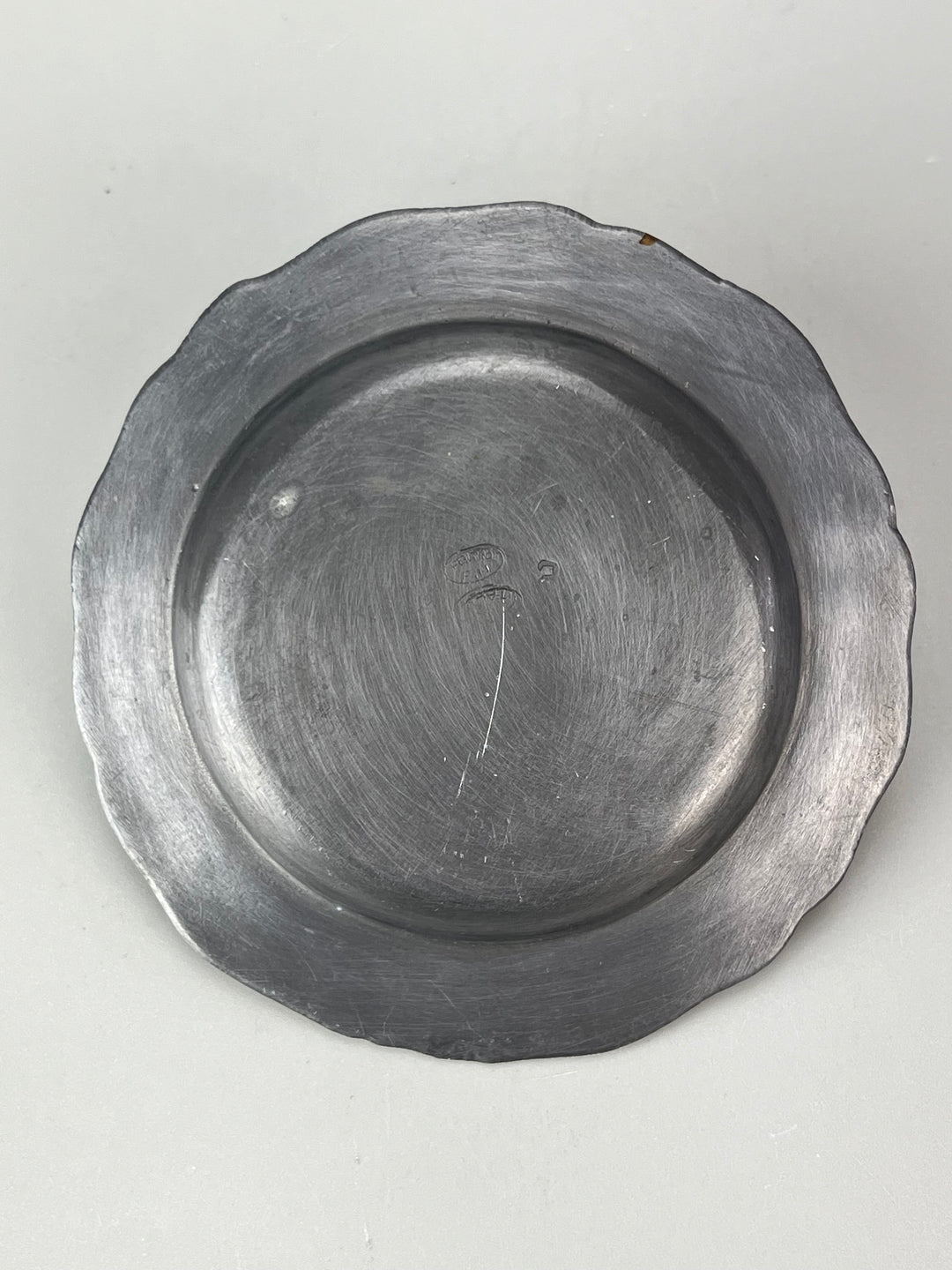 Set di 12 sottobicchieri in peltro e bordo sagomato