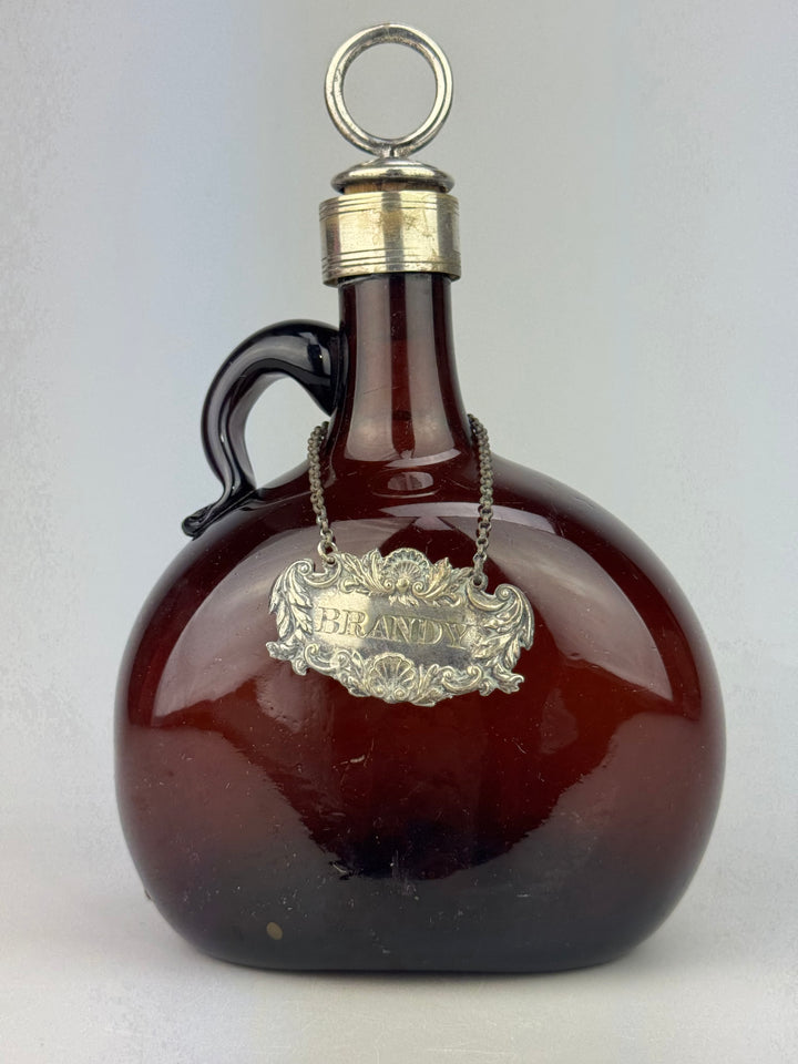 Bottiglia Decanter Brandy in vetro soffiato ambra targa silverplate vintage