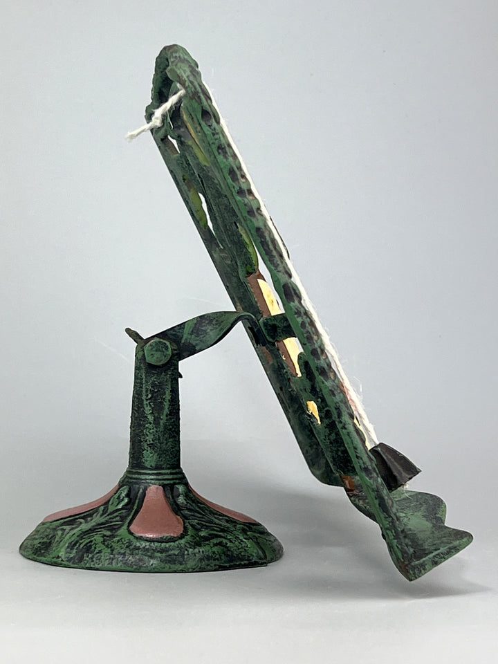 Leggio vintage in ghisa decorata scena con papere