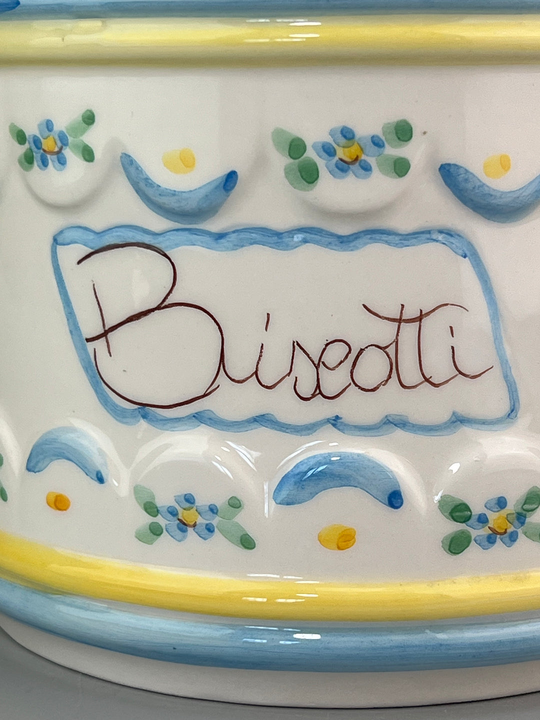Barattolo portabiscotti in porcellana con decorazione blu e gialla