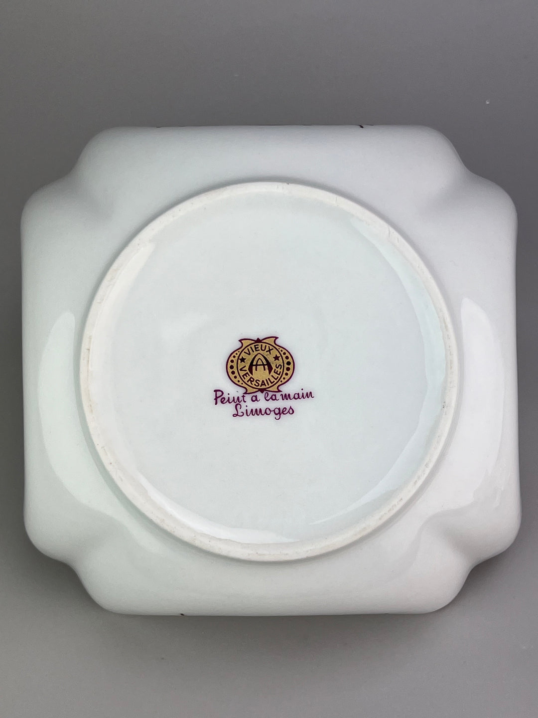 Svuotatasche in porcellana Limoges decoro fogliaceo dorato e bordeaux