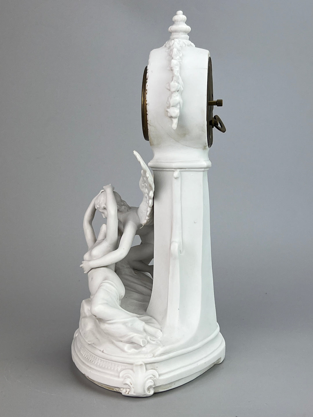 Orologio da Mensola in Biscuit – Scultura “Amore e Psiche” – Junghans (Germania)