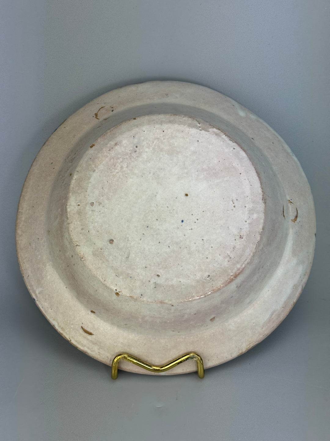 Piatto in maiolica decorata in blu produzione popolare italiana
