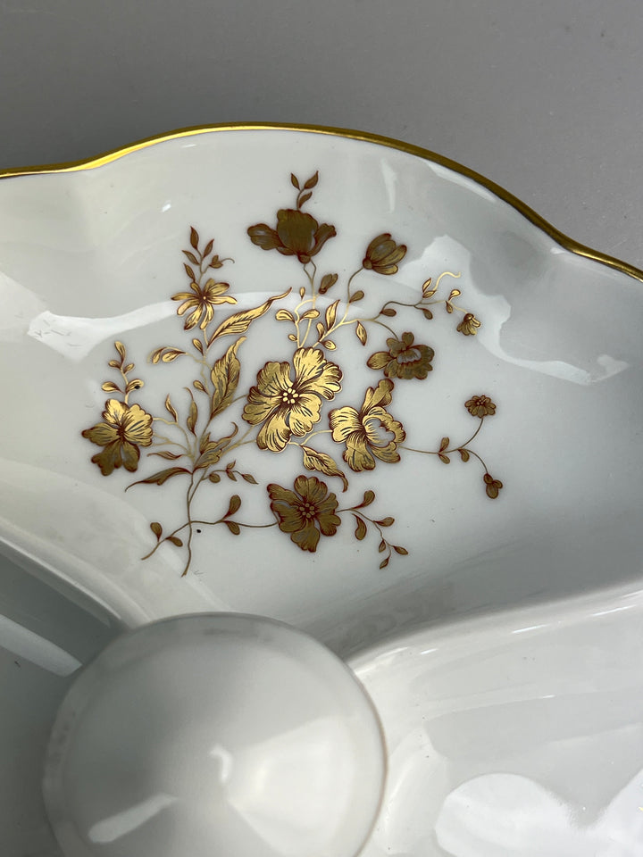 Piatto in porcellana Limoges con decoro dorato