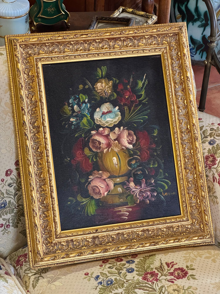 Dipinto a olio su tela firmato Franchi raffigurante un vaso di fiori colorati su fondo scuro, con cornice dorata decorata.