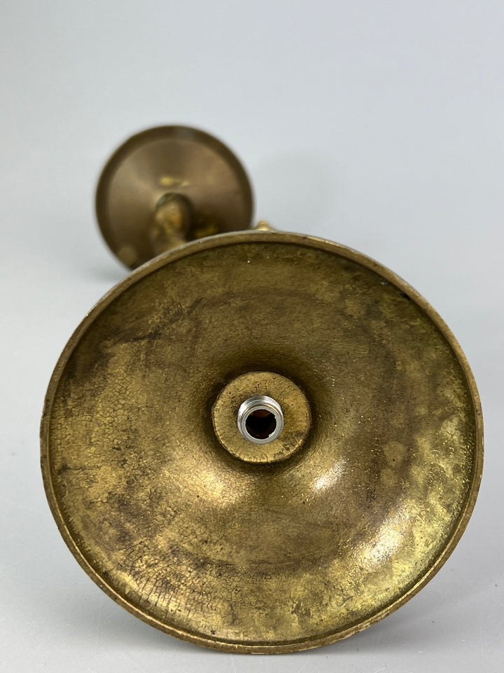 Coppia di putti portacandela in ottone dorato