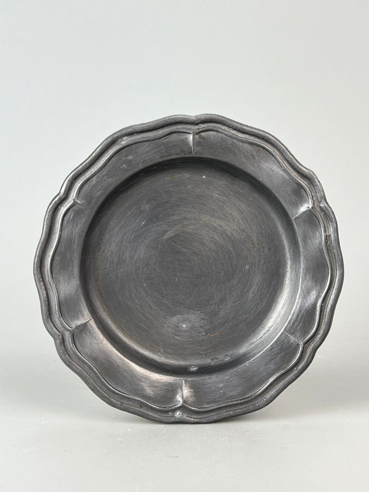 Set di 12 sottobicchieri in peltro e bordo sagomato