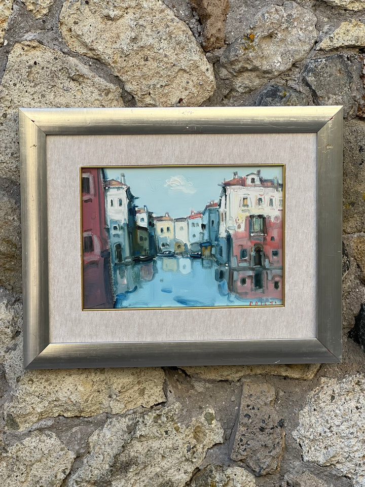 Quadro dipinto ad olio firmato Paolo Sebastiani, che immortala un caratteristico scorcio di un canale veneziano. Le delicate pennellate e i colori vibranti rievocano la magia e il romanticismo delle calli e dei palazzi che si specchiano sull’acqua.

Un'opera che incanta per il suo stile impressionista e la capacità di catturare la luce e i riflessi dell'acqua.&nbsp;

Misure 53x43 cm