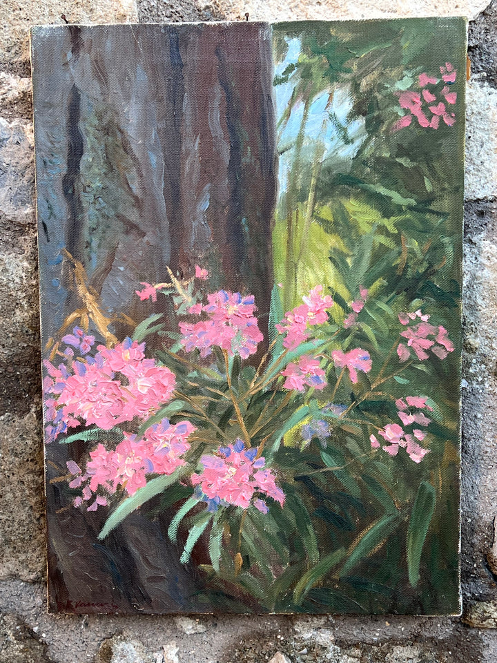 Splendido dipinto ad olio su tela raffigurante un cespuglio di rododendri in piena fioritura. L'opera cattura la bellezza naturale dei fiori rosa e lilla, in contrasto con il verde intenso del fogliame e il tronco maestoso dell'albero sullo sfondo.

Perfetto per aggiungere un tocco di colore e natura a qualsiasi ambiente.

Misure 50x70 cm