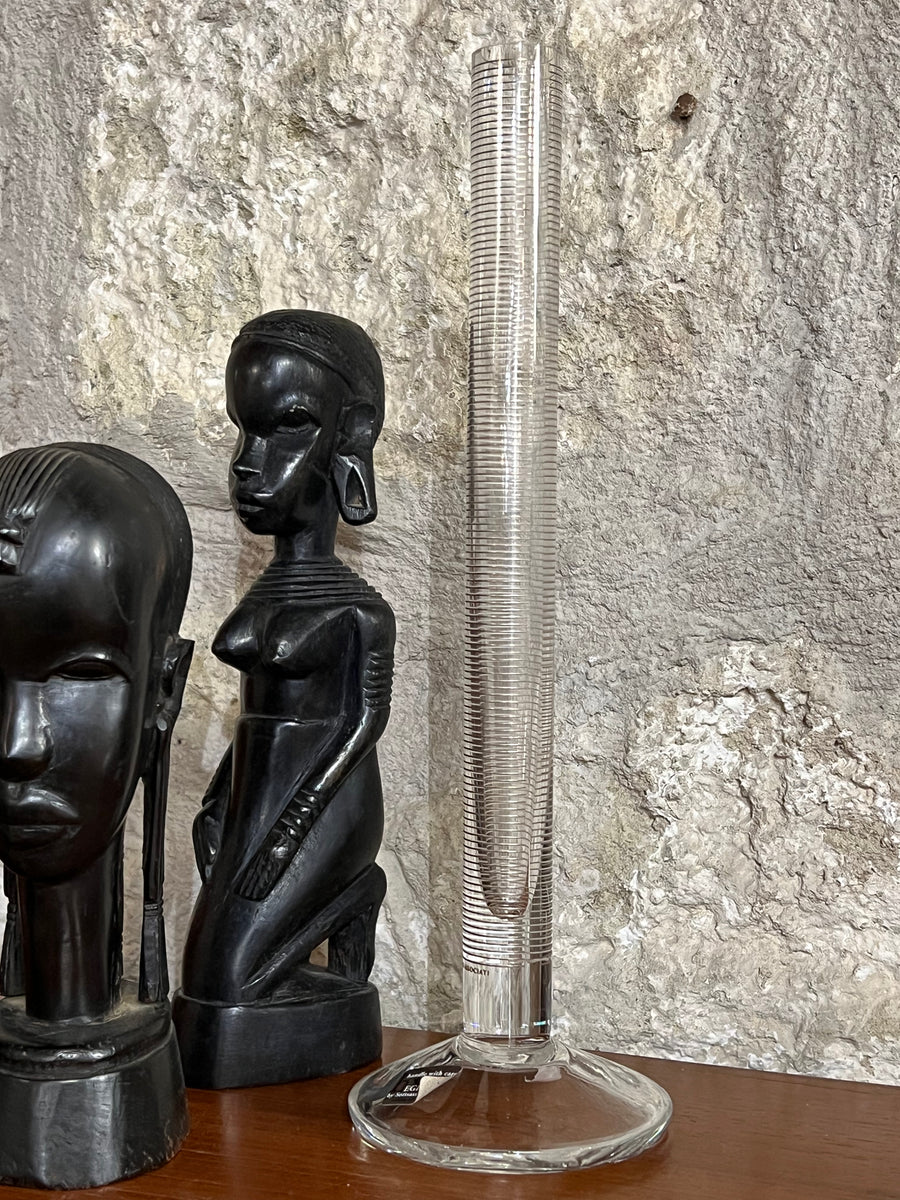 Vaso monofore in cristallo del marchio Egizia realizzato da Defne Koz per Sottsass Associati con decoro a cerchi argentati.<br><br>Misure Diametro base 9 cm altezza 31cm<br>
