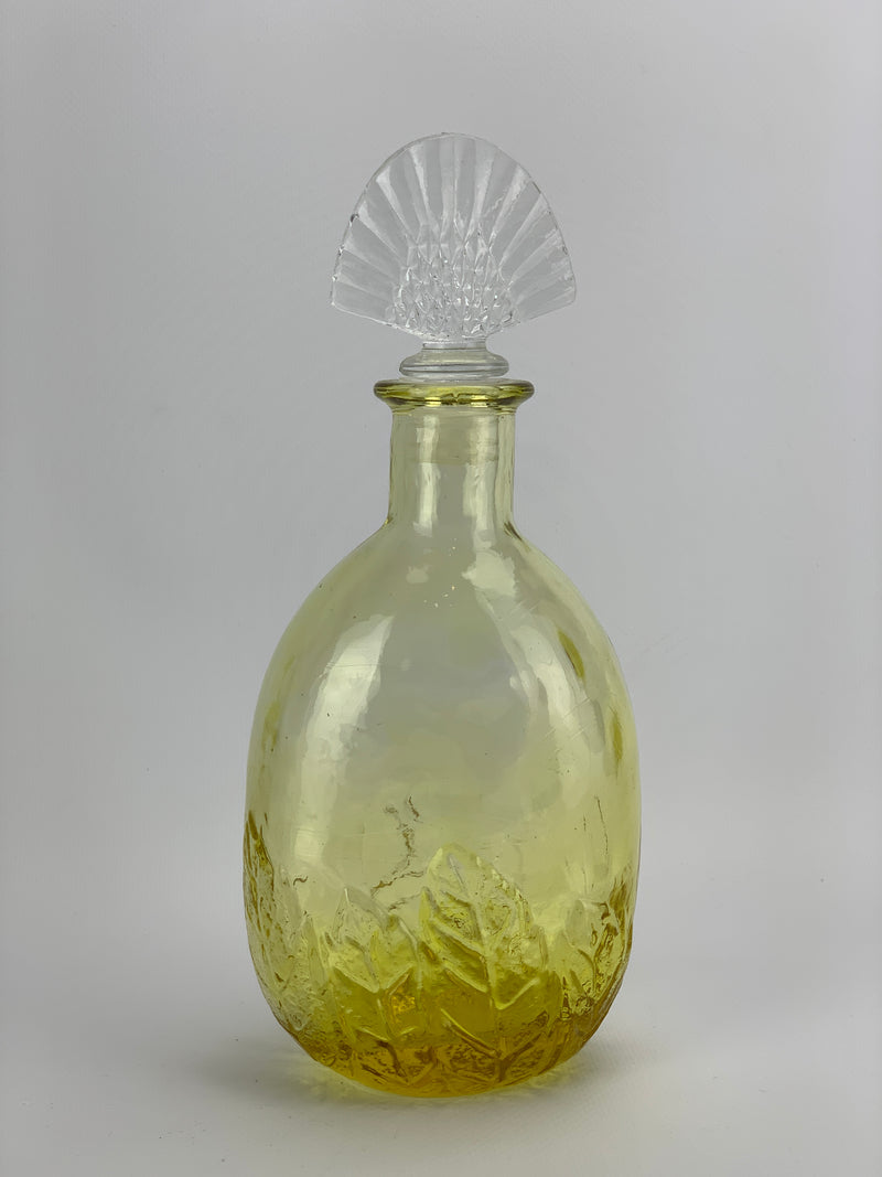Bottiglia vetro giallo forma ovale