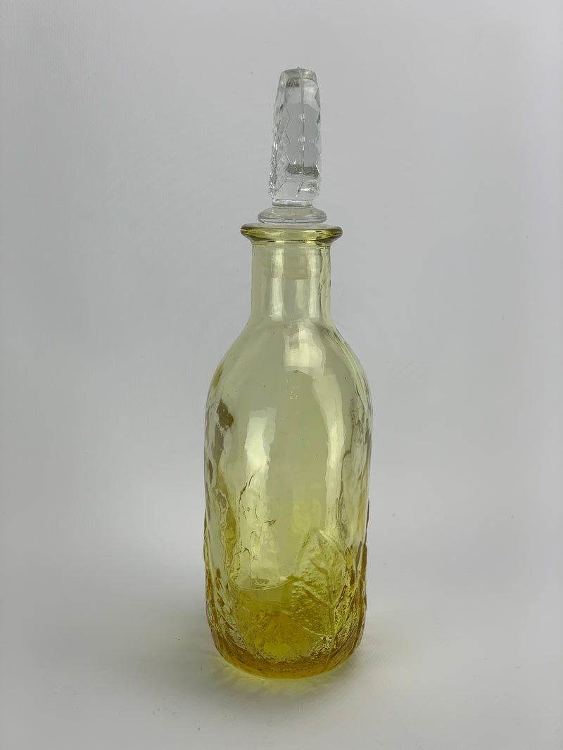 Bottiglia vetro giallo forma ovale