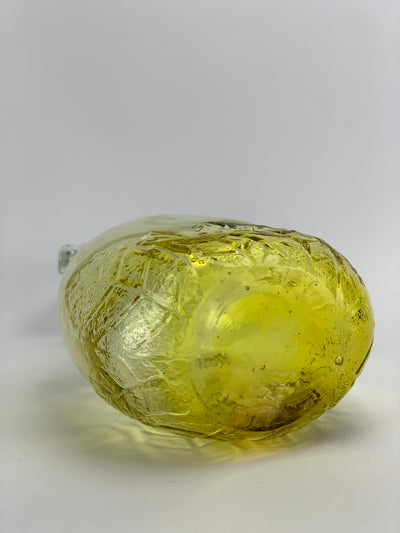 Bottiglia vetro giallo forma ovale