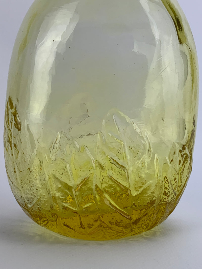 Bottiglia vetro giallo forma ovale