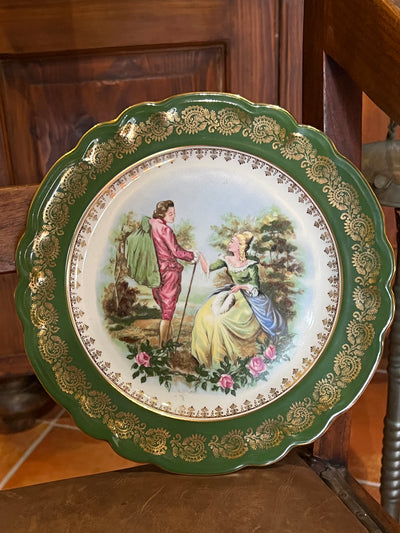 Piatto da parete in porcellana decorata Limoges France.