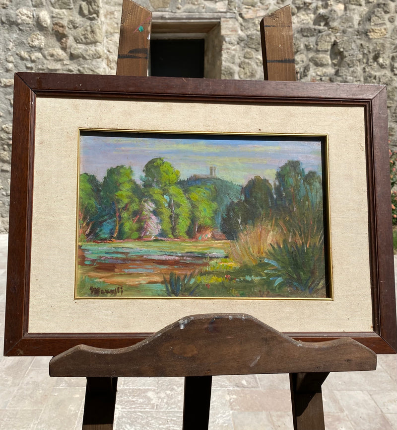 Quadro olio su cartoncino raffigurante paesaggio firmato Marelli in basso a sinistra.