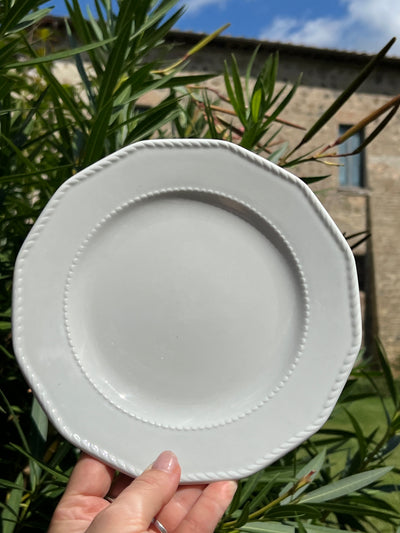 Set di otto piatti da dolce in porcellana, firmato Richard Ginori.